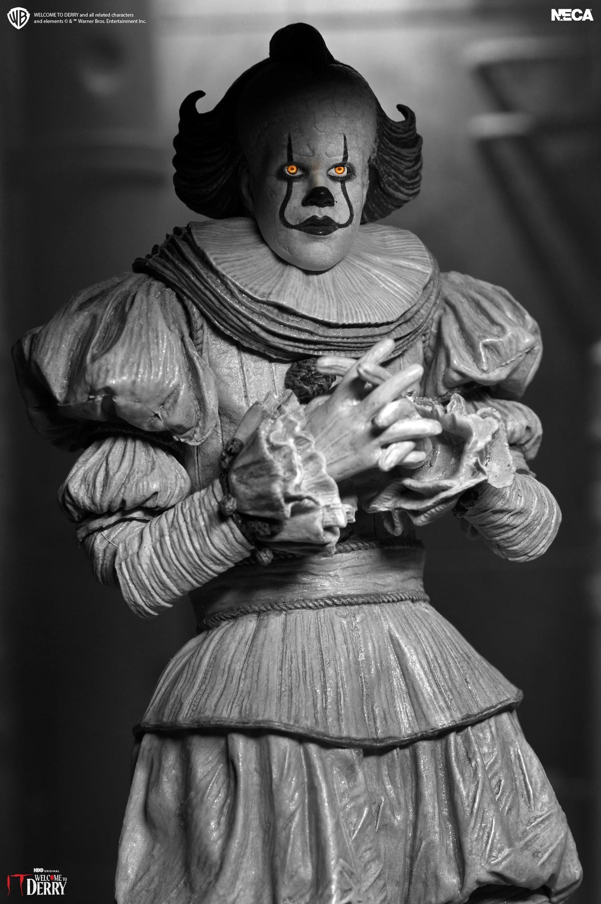 IT: Welcome to Derry - Ultimate Black & White Pennywise 7” Scale Action Figure (PRE-ORDER)