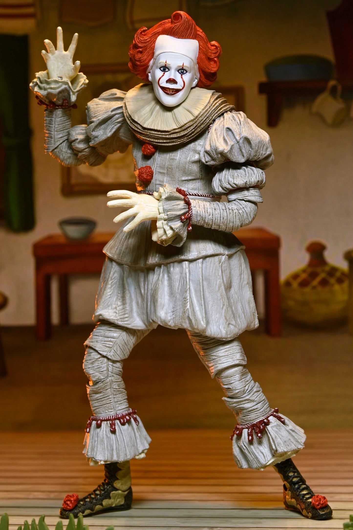 IT: Welcome to Derry - Ultimate Bob Gray as Pennywise 7" Scale Action Figure (PRE-ORDER)