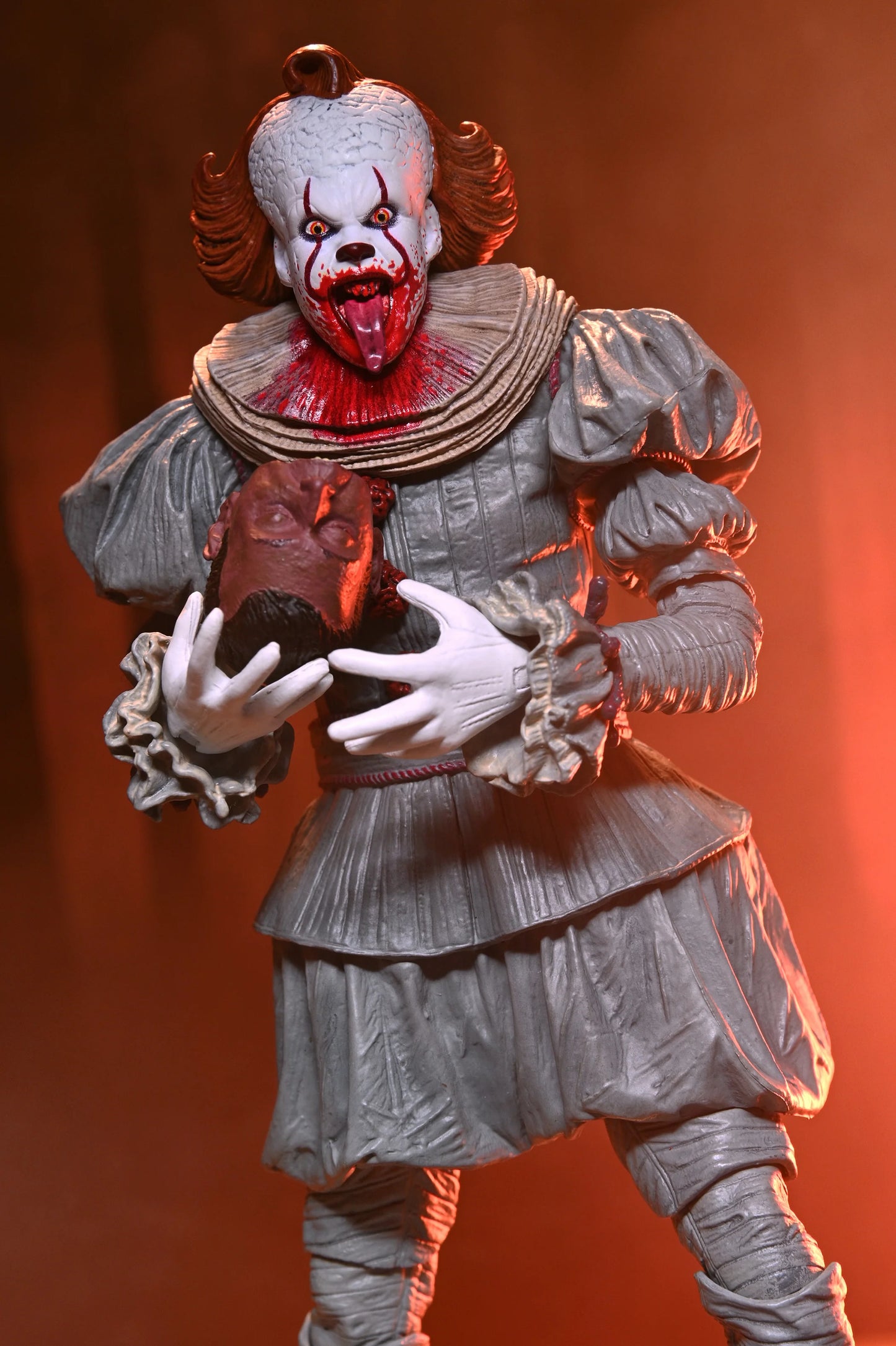 IT: Welcome to Derry - Ultimate Pennywise 7" Scale Action Figure (PRE-ORDER)