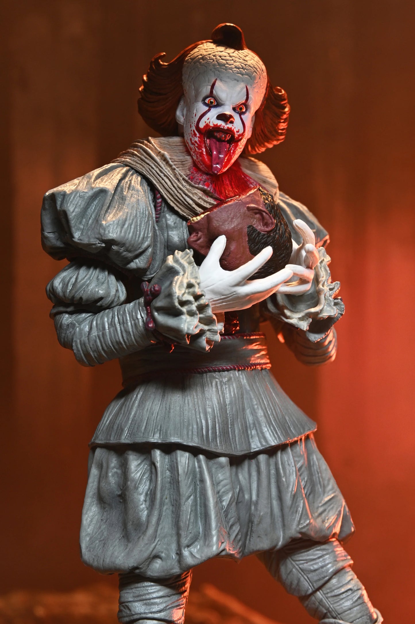 IT: Welcome to Derry - Ultimate Pennywise 7" Scale Action Figure (PRE-ORDER)