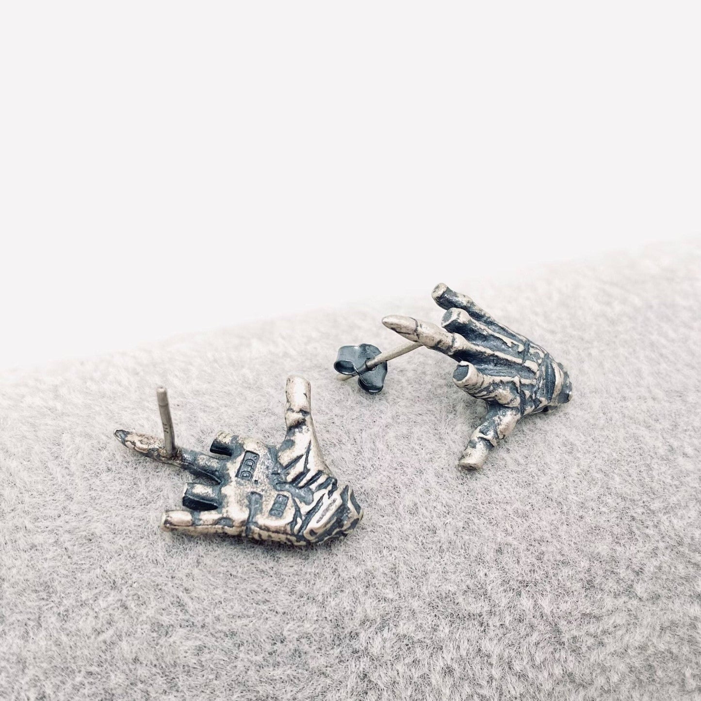 EARRINGS - Sterling Silver Skull Hand Bone Middle Finger Stud Earrings