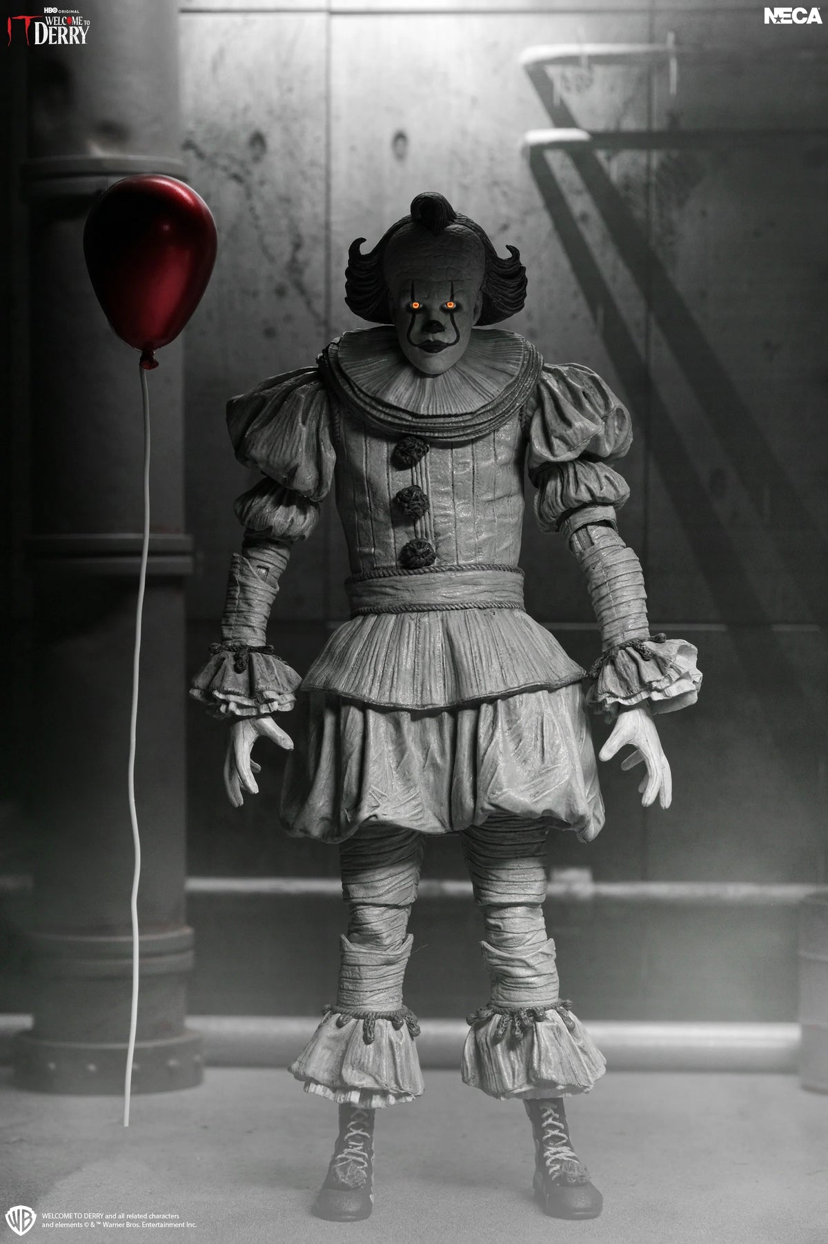 IT: Welcome to Derry - Ultimate Black & White Pennywise 7” Scale Action Figure (PRE-ORDER)
