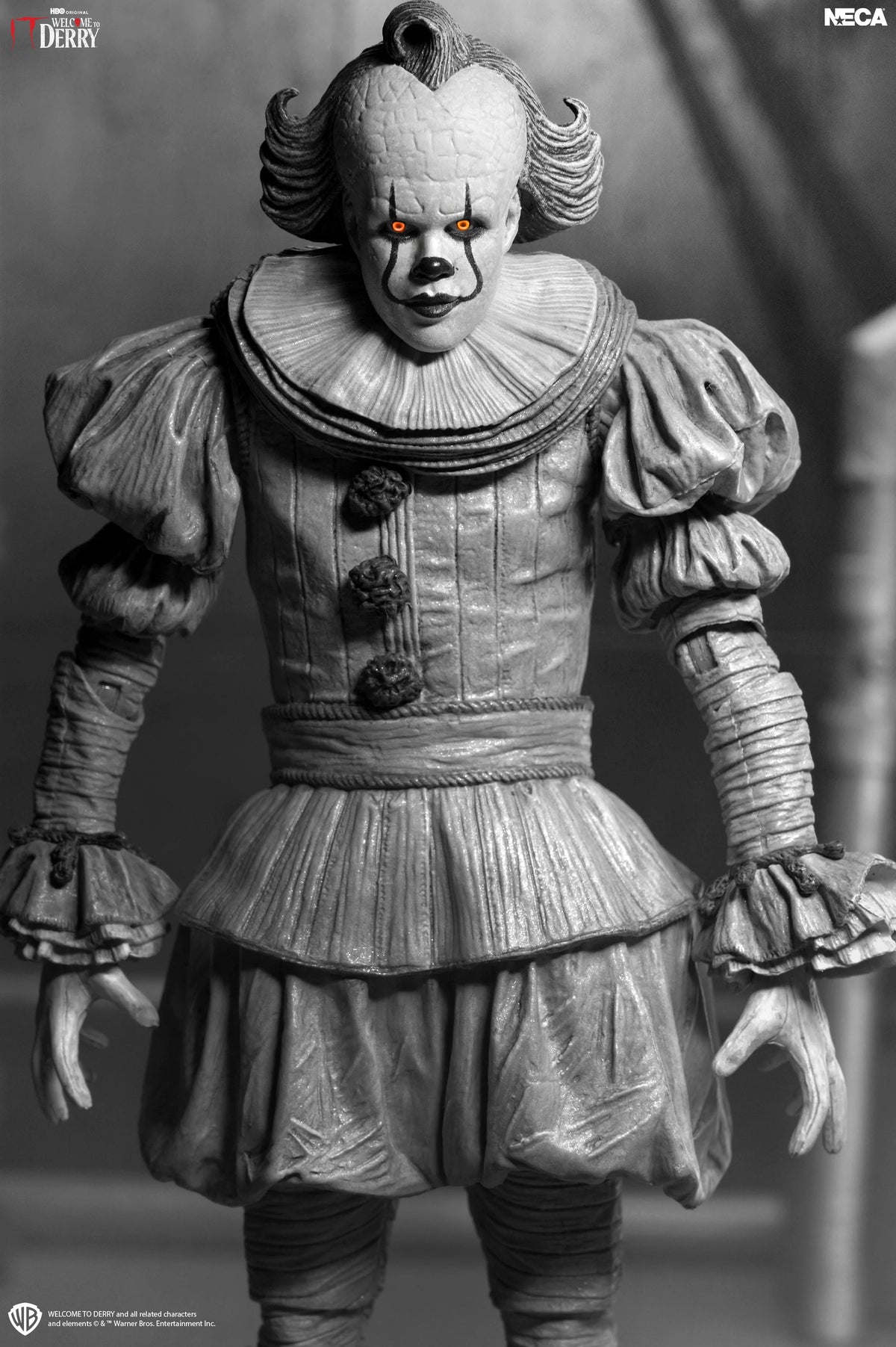 IT: Welcome to Derry - Ultimate Black & White Pennywise 7” Scale Action Figure (PRE-ORDER)