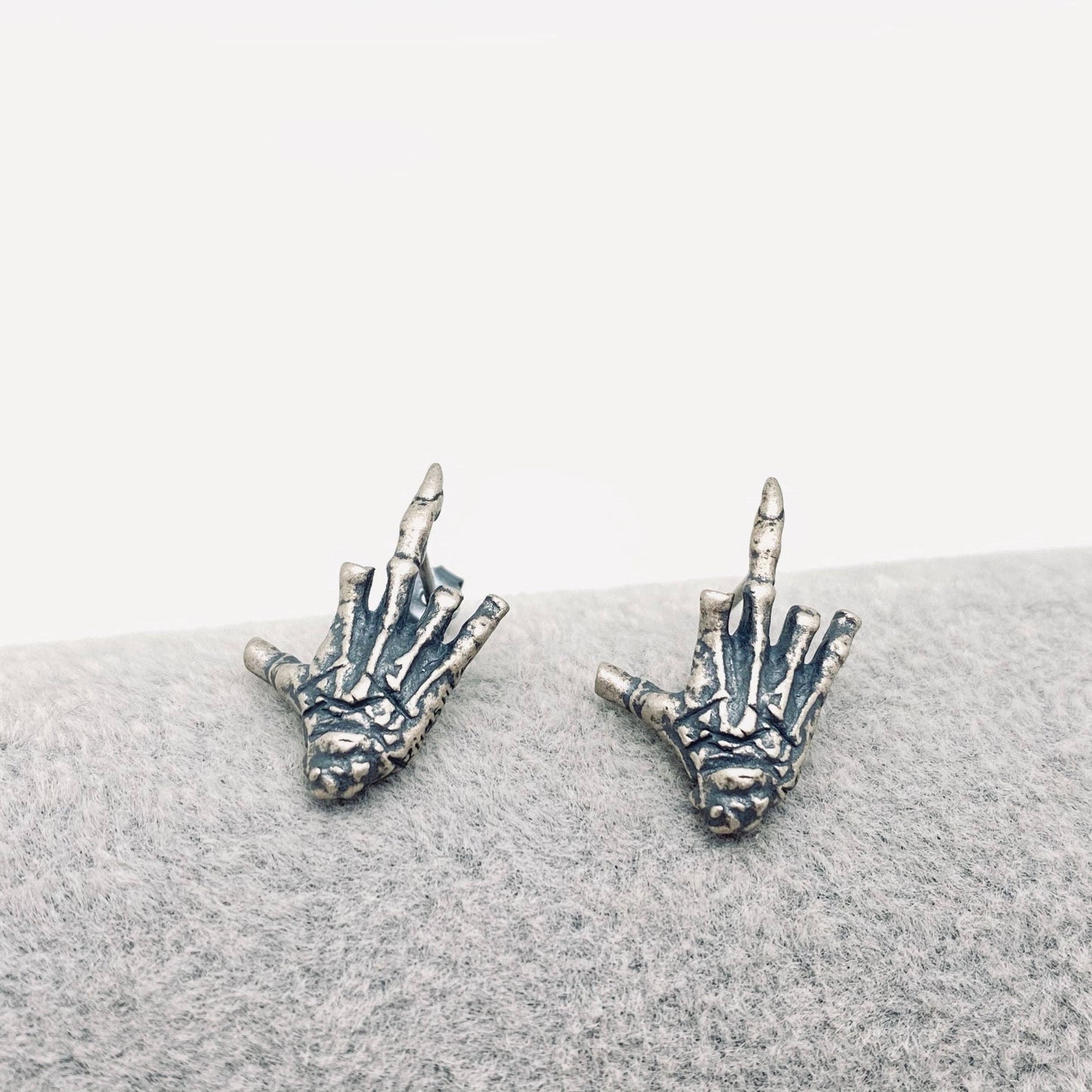 EARRINGS - Sterling Silver Skull Hand Bone Middle Finger Stud Earrings