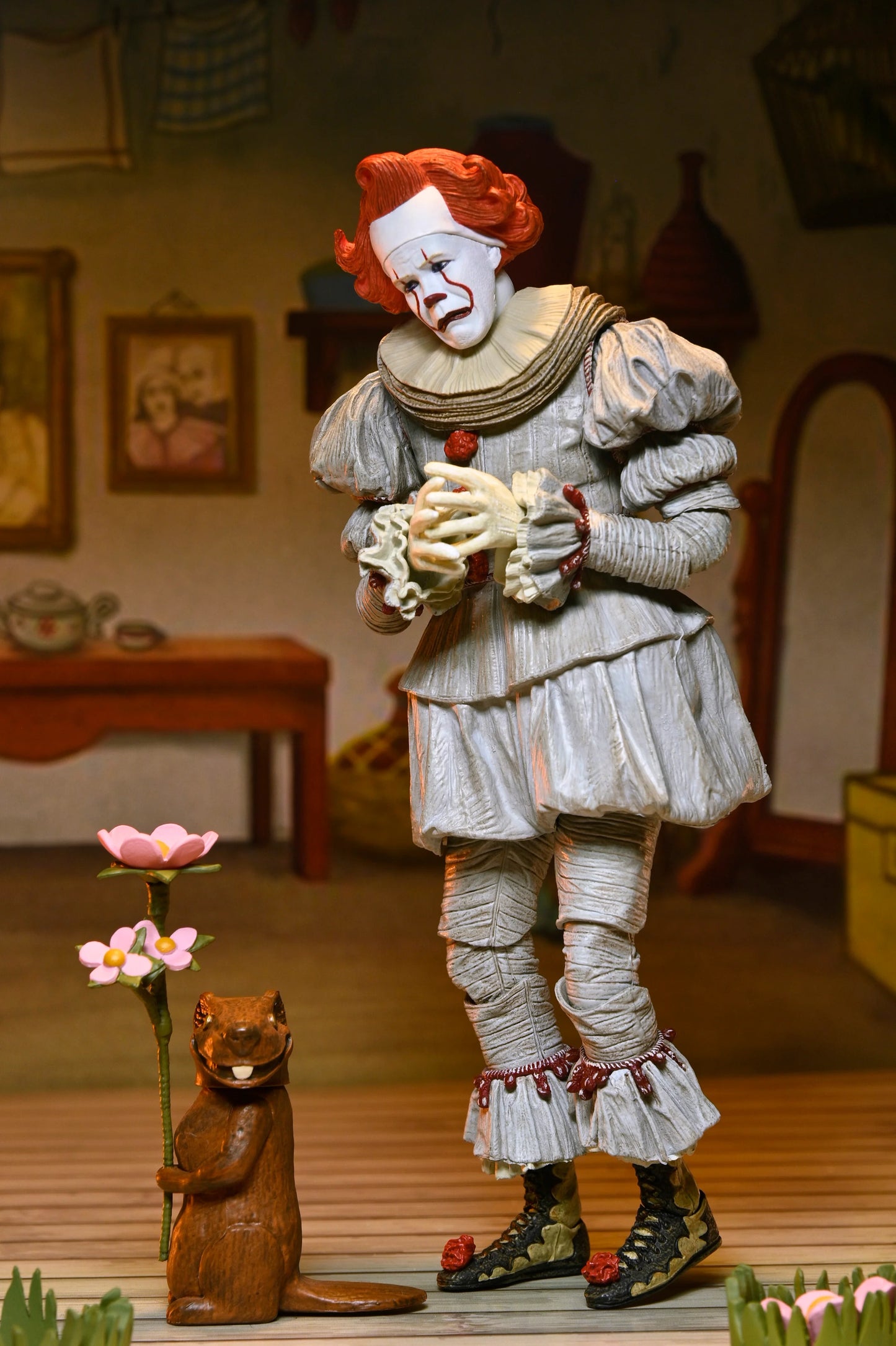 IT: Welcome to Derry - Ultimate Bob Gray as Pennywise 7" Scale Action Figure (PRE-ORDER)