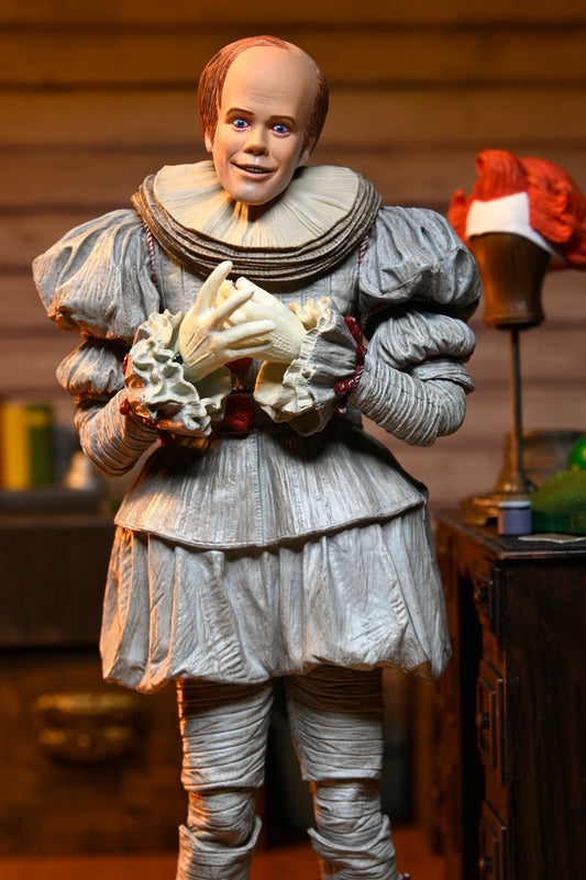 IT: Welcome to Derry - Ultimate Bob Gray as Pennywise 7" Scale Action Figure (PRE-ORDER)