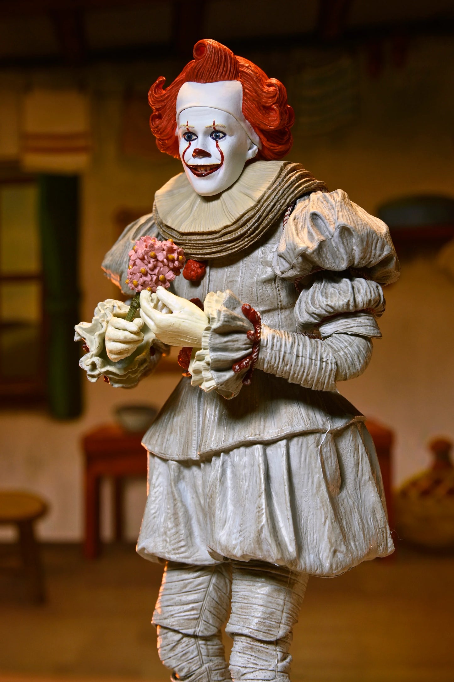 IT: Welcome to Derry - Ultimate Bob Gray as Pennywise 7" Scale Action Figure (PRE-ORDER)